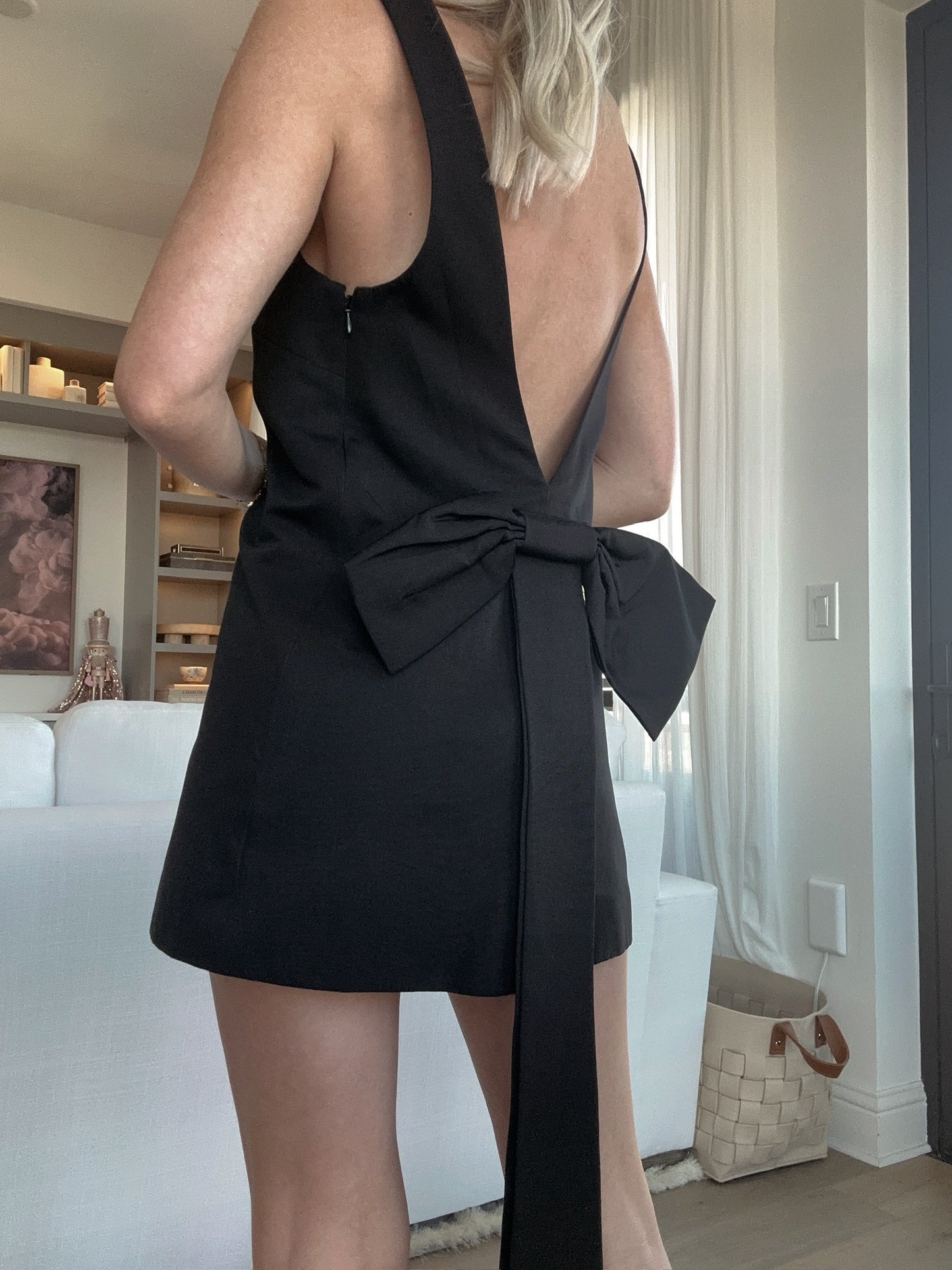 back with a bow