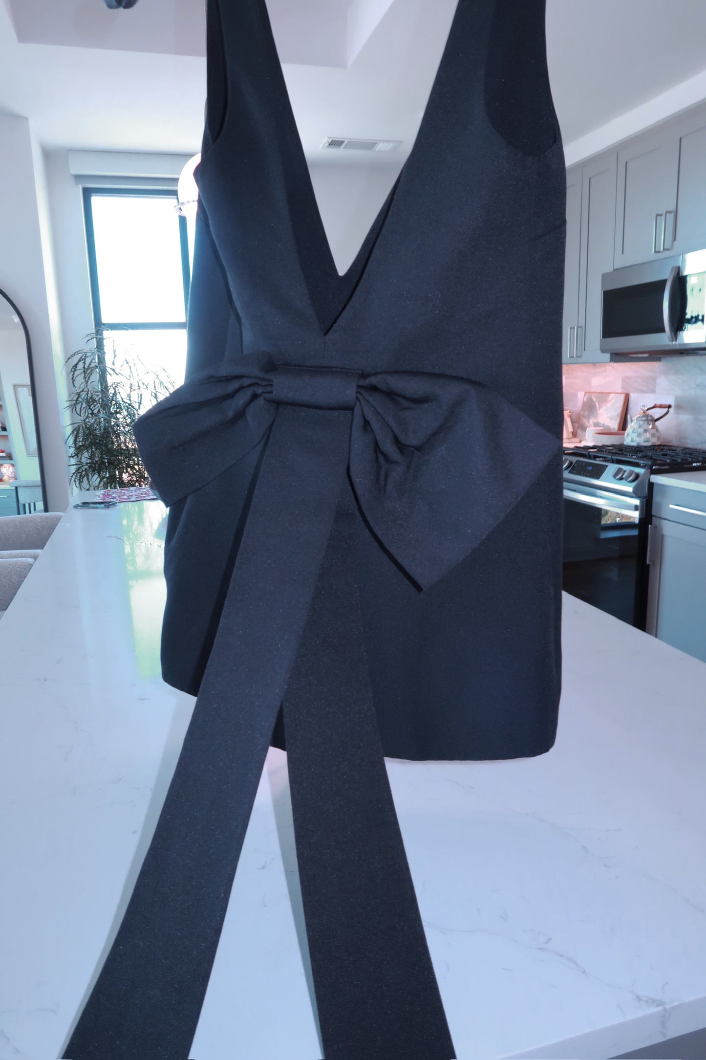 back with a bow